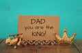 greeting card, plane toy and glitter king crown. Father& x27;s day concept