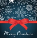 Greeting card with red bow on snowflakes background and copy space Royalty Free Stock Photo