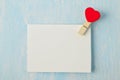 Greeting card with red heart wooden clothespin Royalty Free Stock Photo