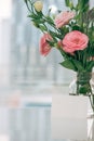 A greeting card template with a place for text, a photo of a blank frame in a bouquet of lisianthus flowers