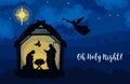 Greeting card of Traditional Christian Christmas Nativity Scene of baby Jesus in the manger with Mary and Joseph in Royalty Free Stock Photo