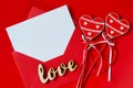 Greeting card for Valentine`s Day. Red envelope with blank white paper. Mockup of love letter Royalty Free Stock Photo