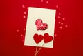 Greeting card for Valentinen`s Day with wooden red hearts