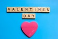 Greeting card for Valentine's Day.  Pink hearts and letter on a blue background. Copy space.  The concept of holiday and love Royalty Free Stock Photo