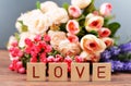 Greeting card withflowers with gift box on holiday saint valentine`s day Royalty Free Stock Photo