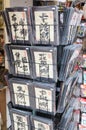 Greeting cards with Chinese names translated in English on display for sale