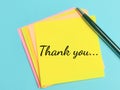 Phrase THANK YOU written on sticky note with a pen. Royalty Free Stock Photo