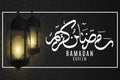 Greeting invitation card for Ramadan Kreem. Dark lanterns glow with golden light on a black background with Islamic ornament. Eid