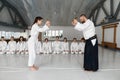 Greeting of sensei and student before battle with wooden sword