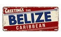 Greetings from Belize vintage rusty metal plate