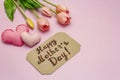 Greetings card for Happy Mothers Day. Gentle pink tulips, handmade felt hearts Royalty Free Stock Photo