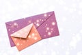 Winter holiday blank paper envelopes on marble with shiny snow flatlay background, love letter or Christmas mail card design