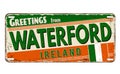 Greetings from Waterford vintage rusty metal plate