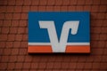 Greetsiel, Germany 12 March 2021, The brand logo of `Volksbank Raiffeisenbank` from a branch in Greetsiel