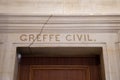 Greffe civil text on ancient wall facade building means in french civil registry justice court