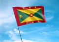 Grenada flag flying high in the sky. February 07 Grenada independence day world national flag collection