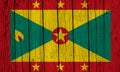 Grenada Flag Over Wood Planks