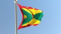 Grenadian flag on flagpole.