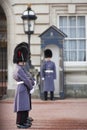 Grenadier guards wearing winter greatcoats