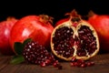 Grenadine fruits and seeds on wooden table Royalty Free Stock Photo