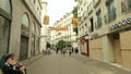GRENOBLE, FRANCE - JULY 1, 2023. Broken storefronts with wooden panels after night riots in city centre