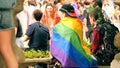 GRENOBLE, FRANCE - JULY 1, 2023. Young people with rainbow LGBTQ flag attend festival in the city