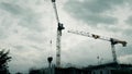GRENOBLE, FRANCE - SEPTEMBER 20, 2023. Modern residential building construction site with two Potain tower cranes