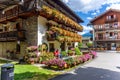 Gressoney Saint-Jean, Italy. In Via Monte Rosa, view of a Aosta-style house with wooden balconies richly decorated.