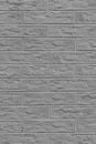 Grey abstract brick wall pattern texture facade house background Royalty Free Stock Photo