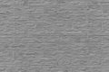 Grey abstract brick wall pattern texture facade house background structure backdrop Royalty Free Stock Photo