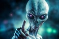 A grey alien character pointing its finger, evoking themes of UFO sightings, Area 51. Copy space on blurred background