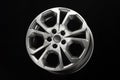 grey alloy wheels, stylish unusual design, dark background