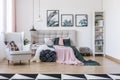 Grey armchair in bedroom interior Royalty Free Stock Photo