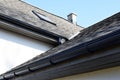 Grey asphalt shingles roof construction