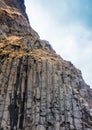 Grey basalt columns near Reynisdrangar beach, Iceland .