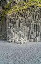 Grey basalt columns of varying height and thickness and depth, I