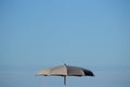 Grey beach umbrella