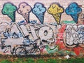 Grey-black fixie bicycle in front of the wall with ice-cream graffiti Royalty Free Stock Photo