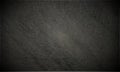 Grey and black grunge paper textured background. Royalty Free Stock Photo