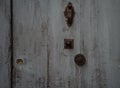 Grey blue  old  French door ,with knocker & handle Royalty Free Stock Photo