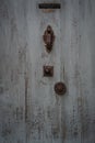 Grey blue  old  French door ,with knocker & handle Royalty Free Stock Photo