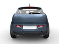 Grey blue small electric car - back view Royalty Free Stock Photo