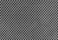 Grey breathable porous poriferous material for air ventilation with holes. Black and white Sportswear nylon texture Royalty Free Stock Photo