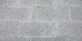 Grey brick cinder block wall background concrete tile cladding seamless texture Royalty Free Stock Photo