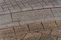 Grey brick stone street road. Light sidewalk, pavement texture. Road Royalty Free Stock Photo