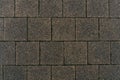 Grey brick stone street road. Light sidewalk, pavement texture. Road Royalty Free Stock Photo