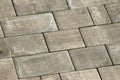 Grey brick wall background close up. Gray stone tile block background. ray pavement slabs or stones for floor textured Royalty Free Stock Photo