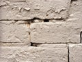 Grey brick wall with peeling paint background texture Royalty Free Stock Photo