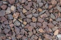 Grey and brown rubble texture. Gravel pebbles stone background. Grey and brown small rocks ground Royalty Free Stock Photo