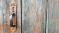 Grey and brown Wooden Door Planking Texture with vintage door handle Royalty Free Stock Photo